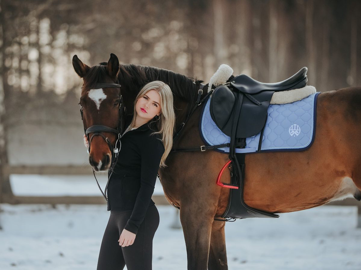 Aurorish equestrian team rider Nikola Avkštola and her horse, her horse is wearing Powder blue saddle pad 